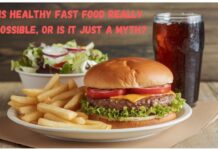 Is Healthy Fast Food Really Possible, or Is It Just a Myth? A photo of a burger and fries with a side of salad and a drink; the burger is from a fast food chain that offers healthy fast food.